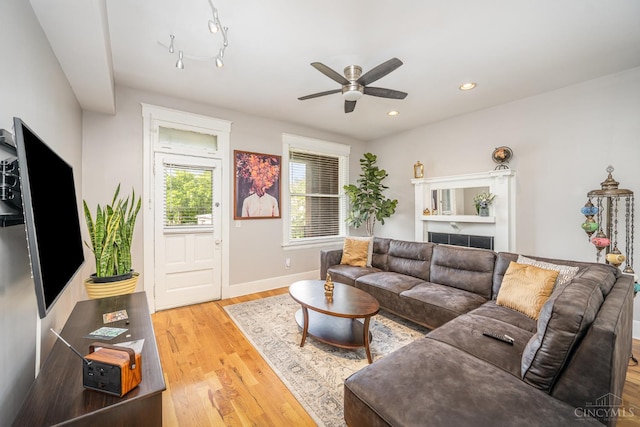 709 E Mcmillan St Unit 1, Cincinnati, OH 45206 - living area with a ceiling fan, wood finished floors, baseboards, and recessed lighting