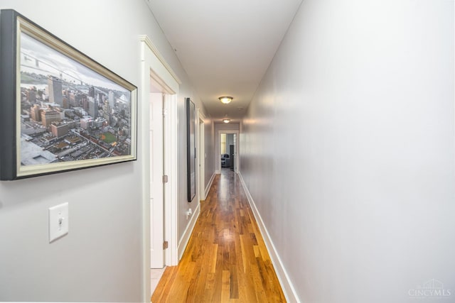 709 E Mcmillan St Unit 1, Cincinnati, OH 45206 - corridor featuring wood finished floors and baseboards