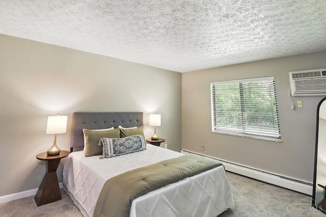 6607 Hearne Rd Unit 90, Green Twp, OH 45248 - carpeted bedroom featuring a baseboard radiator, an AC wall unit, baseboards, and a textured ceiling