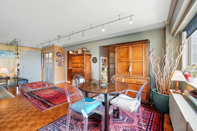 1617 E Mcmillan St Unit 605, Cincinnati, OH 45206 - dining area featuring crown molding and track lighting