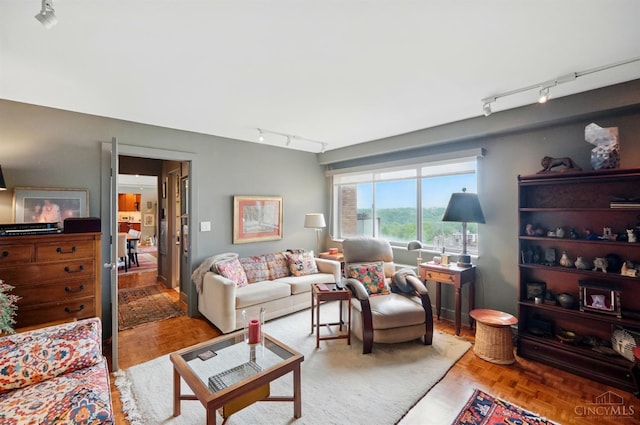1617 E Mcmillan St Unit 605, Cincinnati, OH 45206 - living area with rail lighting
