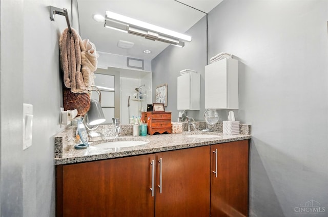 1617 E Mcmillan St Unit 605, Cincinnati, OH 45206 - bathroom featuring double vanity and a shower