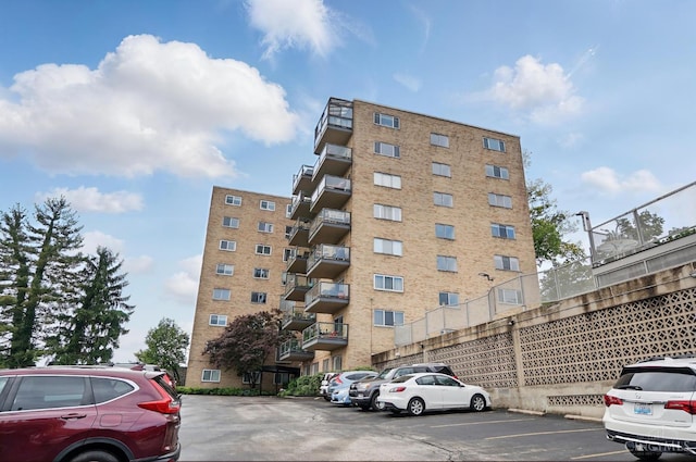 1617 E Mcmillan St Unit 605, Cincinnati, OH 45206 - view of apartment building / complex featuring uncovered parking