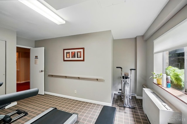 1617 E Mcmillan St Unit 605, Cincinnati, OH 45206 - workout area with baseboards and heating unit