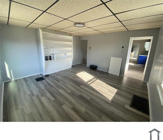2196 Champlain St, Cincinnati, OH 45214 - empty room featuring a paneled ceiling and wood finished floors