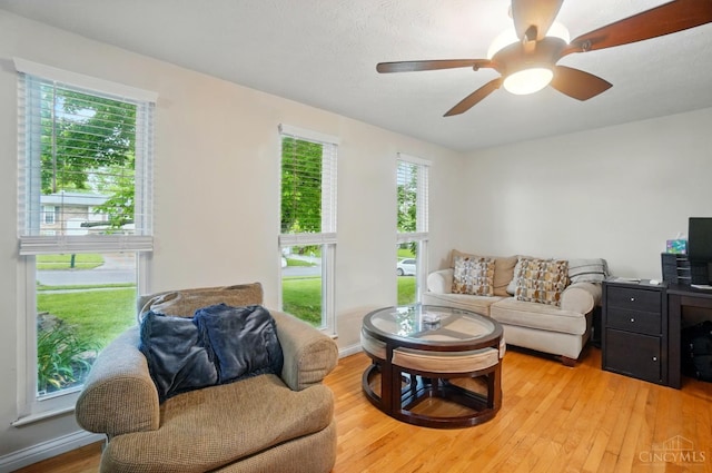 12056 Hazelhurst Ln, Springfield Twp, OH 45240 - living area with light wood-type flooring and ceiling fan