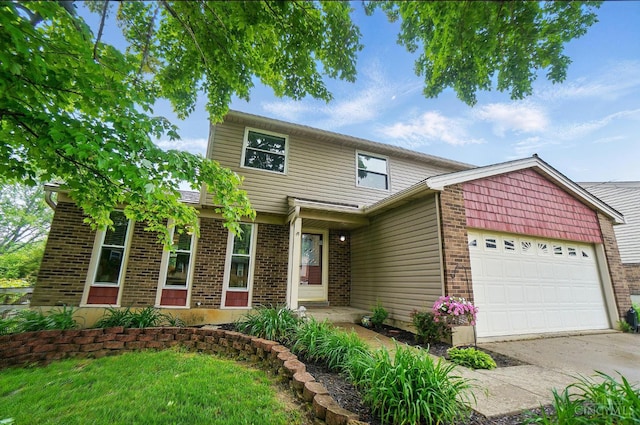 12056 Hazelhurst Ln, Springfield Twp, OH 45240 - traditional home featuring brick siding, a garage, and driveway