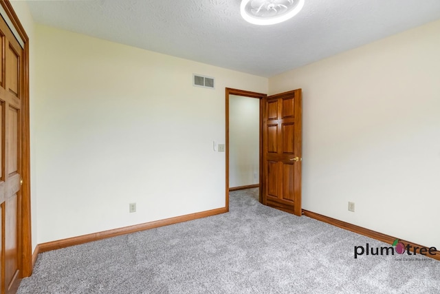 378 Natalie Ln, Turtle Creek Twp, OH 45036 - empty room featuring carpet floors and baseboards