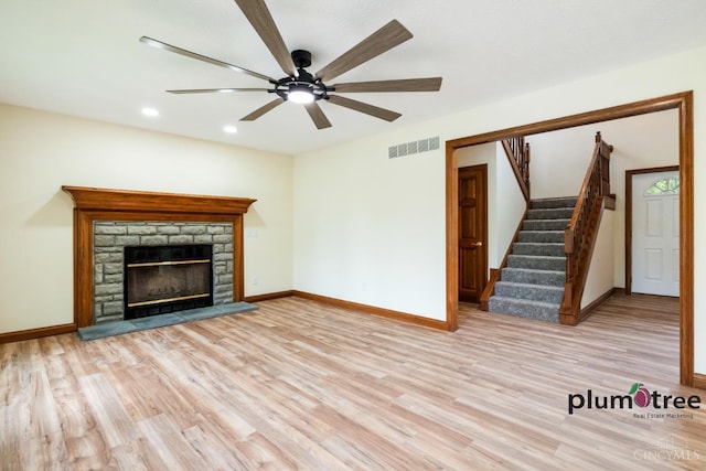 378 Natalie Ln, Turtle Creek Twp, OH 45036 - unfurnished living room featuring baseboards, recessed lighting, light wood finished floors, stairway, and ceiling fan
