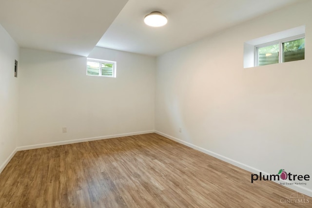 378 Natalie Ln, Turtle Creek Twp, OH 45036 - basement with wood finished floors and baseboards