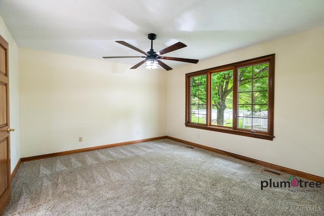 378 Natalie Ln, Turtle Creek Twp, OH 45036 - spare room with carpet flooring, baseboards, and ceiling fan