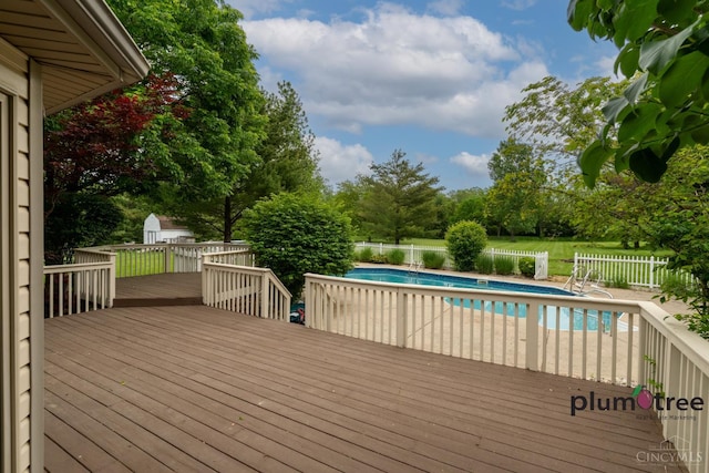 378 Natalie Ln, Turtle Creek Twp, OH 45036 - deck featuring a fenced backyard and a storage shed