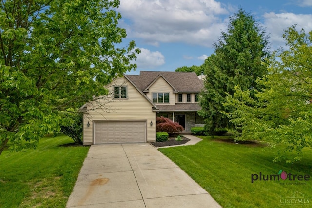 378 Natalie Ln, Turtle Creek Twp, OH 45036 - traditional home featuring driveway, a front yard, an attached garage, and roof with shingles