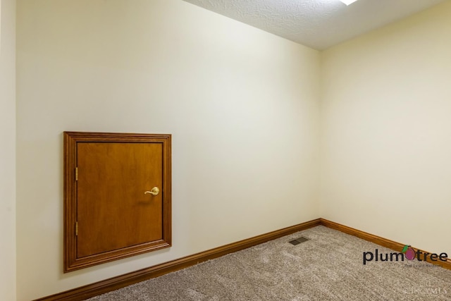 378 Natalie Ln, Turtle Creek Twp, OH 45036 - empty room with carpet flooring, baseboards, and a textured ceiling