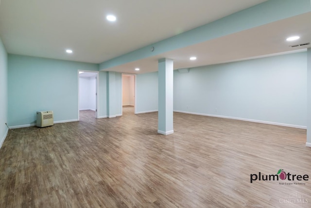 378 Natalie Ln, Turtle Creek Twp, OH 45036 - finished below grade area with wood finished floors, baseboards, and recessed lighting