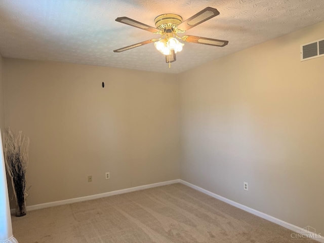 232 Choctaw Cir, Franklin, OH 45005 - unfurnished room with ceiling fan, light carpet, baseboards, and a textured ceiling