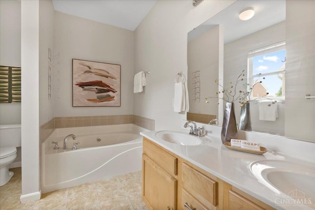 1441 Laurel Park Dr, Cincinnati, OH 45214 - full bathroom with toilet, a garden tub, double vanity, and tile patterned flooring