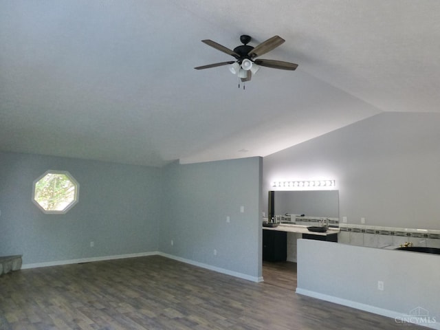 7274 Frey Rd, Goshen Twp, OH 45122 - unfurnished living room featuring vaulted ceiling, ceiling fan, and dark wood-type flooring
