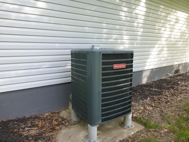 7274 Frey Rd, Goshen Twp, OH 45122 - exterior view of a central air condition unit and crawl space