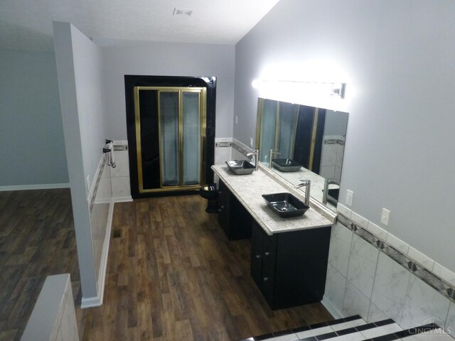 7274 Frey Rd, Goshen Twp, OH 45122 - bathroom with double vanity, wood finished floors, and a shower stall