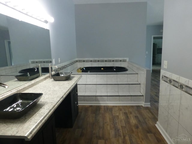 7274 Frey Rd, Goshen Twp, OH 45122 - bathroom featuring wood finished floors and a bath