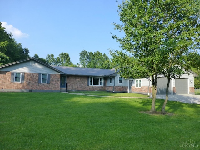 7274 Frey Rd, Goshen Twp, OH 45122 - ranch-style house with brick siding, a front yard, and driveway