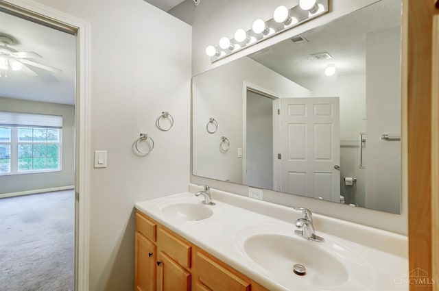 10350 W Rd Unit 34, Harrison, OH 45030 - bathroom with double vanity and ceiling fan