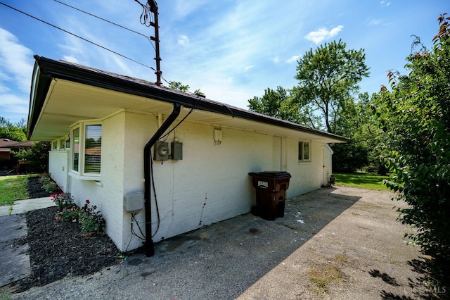 2389 Aquarius Dr, Springfield Twp, OH 45231 - view of side of property featuring brick siding