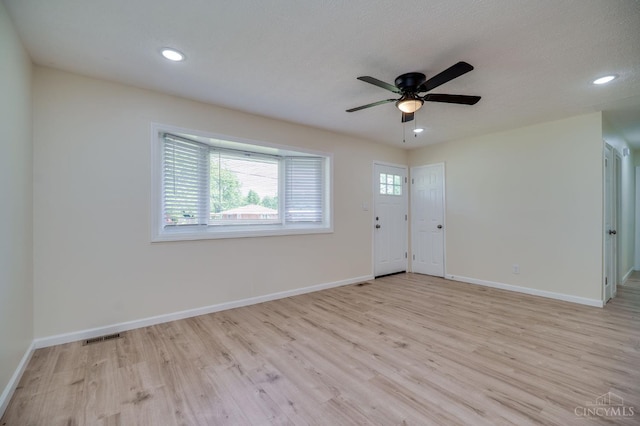 2389 Aquarius Dr, Springfield Twp, OH 45231 - empty room with light wood finished floors, a ceiling fan, baseboards, and recessed lighting