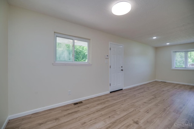 2389 Aquarius Dr, Springfield Twp, OH 45231 - spare room with light wood-type flooring, baseboards, and recessed lighting