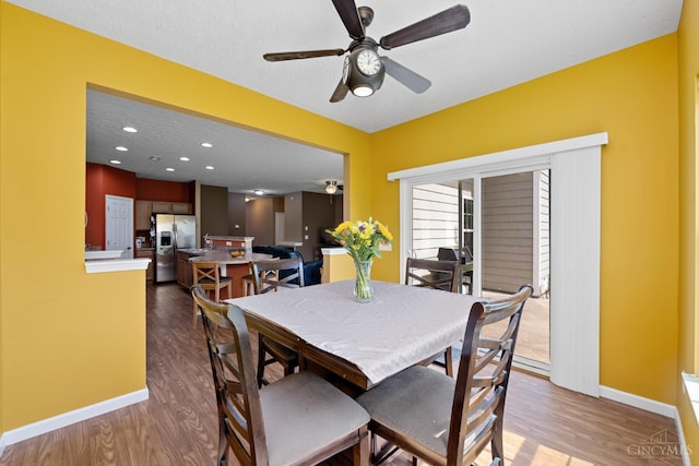 164 Shanda Dr, Monroe, OH 45040 - dining area with wood finished floors, a ceiling fan, baseboards, and recessed lighting