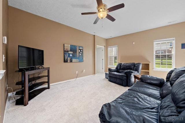 164 Shanda Dr, Monroe, OH 45040 - living area with carpet, a ceiling fan, healthy amount of natural light, and baseboards