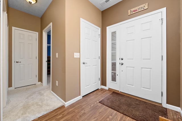 164 Shanda Dr, Monroe, OH 45040 - foyer with baseboards and wood finished floors