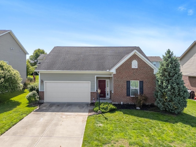 164 Shanda Dr, Monroe, OH 45040 - view of front of house with driveway, an attached garage, a front lawn, and brick siding