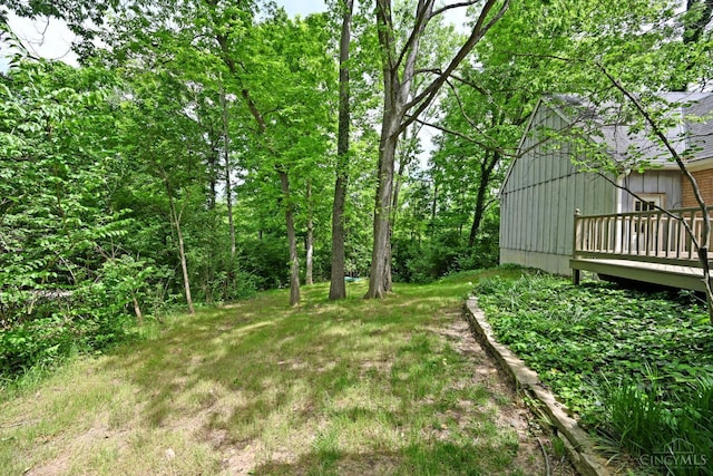 667 N Meadowcrest Cir, Springfield Twp, OH 45231 - view of yard with a wooden deck