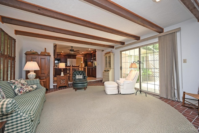 667 N Meadowcrest Cir, Springfield Twp, OH 45231 - tiled living area with beamed ceiling and ceiling fan