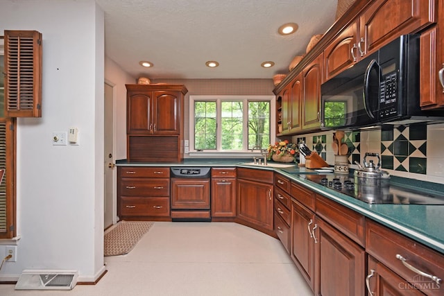 667 N Meadowcrest Cir, Springfield Twp, OH 45231 - kitchen with black appliances, decorative backsplash, recessed lighting, a sink, and a textured ceiling