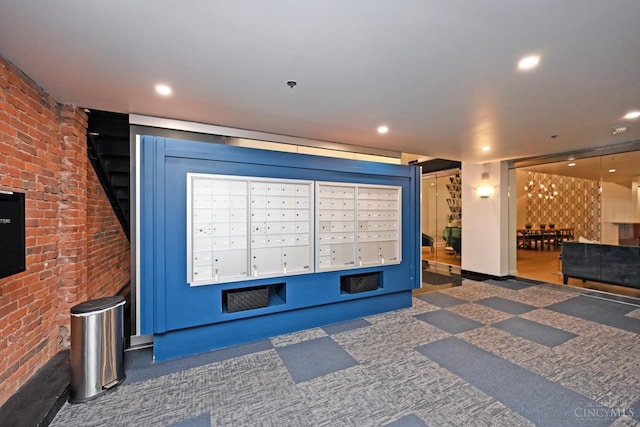 15 W Fourth St Unit 413, Cincinnati, OH 45202 - view of property's community with mail area, brick wall, and recessed lighting