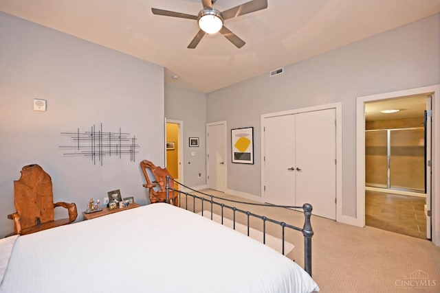 15 W Fourth St Unit 413, Cincinnati, OH 45202 - bedroom featuring light colored carpet, a closet, ceiling fan, and baseboards