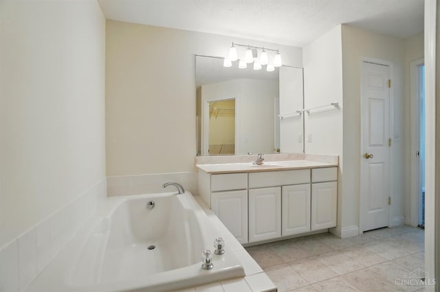7785 Dew Drop Cir, Hamilton Twp, OH 45039 - full bathroom featuring a bath, vanity, a closet, and tile patterned floors