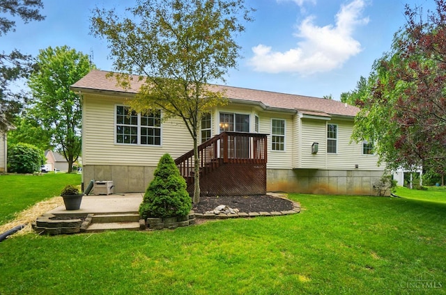 7785 Dew Drop Cir, Hamilton Twp, OH 45039 - rear view of property with a lawn and a patio area