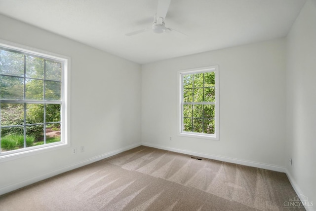 7785 Dew Drop Cir, Hamilton Twp, OH 45039 - empty room with light carpet, ceiling fan, and baseboards