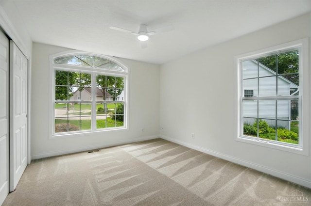 7785 Dew Drop Cir, Hamilton Twp, OH 45039 - empty room with baseboards, carpet floors, and a ceiling fan