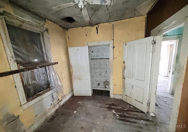 338 S Walnut St, Wilmington, OH 45177 - unfurnished living room featuring ceiling fan