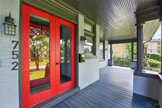 752 S Fred Shuttlesworth Cir, Cincinnati, OH 45229 - wooden porch with french doors