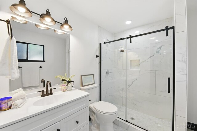 752 S Fred Shuttlesworth Cir, Cincinnati, OH 45229 - full bathroom featuring marble finish floors, vanity, a marble finish shower, and toilet