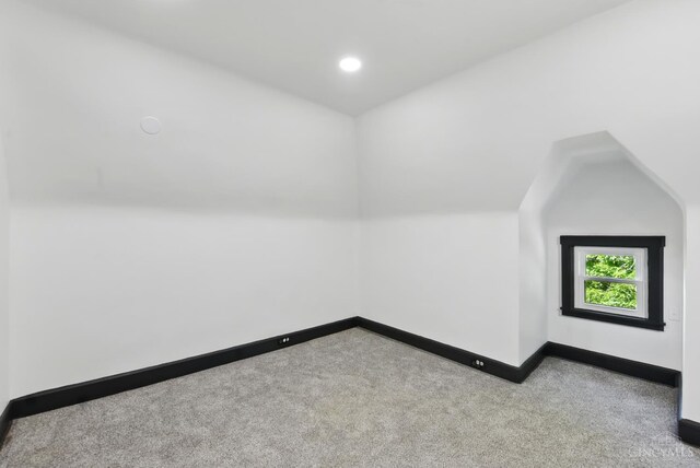 752 S Fred Shuttlesworth Cir, Cincinnati, OH 45229 - additional living space featuring carpet flooring, baseboards, recessed lighting, and vaulted ceiling