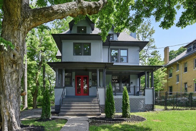 752 S Fred Shuttlesworth Cir, Cincinnati, OH 45229 - view of front of property featuring french doors, a porch, and roof with shingles