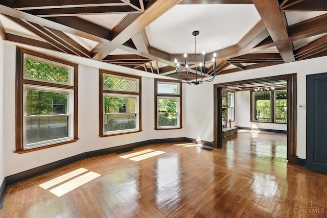 752 S Fred Shuttlesworth Cir, Cincinnati, OH 45229 - spare room with a chandelier, baseboards, hardwood / wood-style floors, coffered ceiling, and beam ceiling