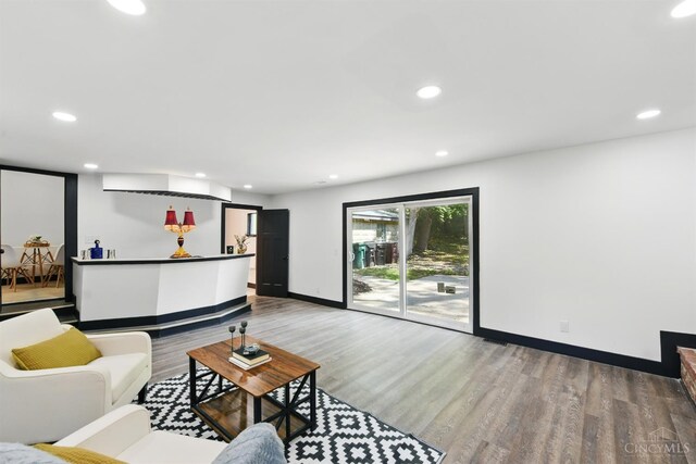 752 S Fred Shuttlesworth Cir, Cincinnati, OH 45229 - living room featuring wood finished floors, baseboards, and recessed lighting